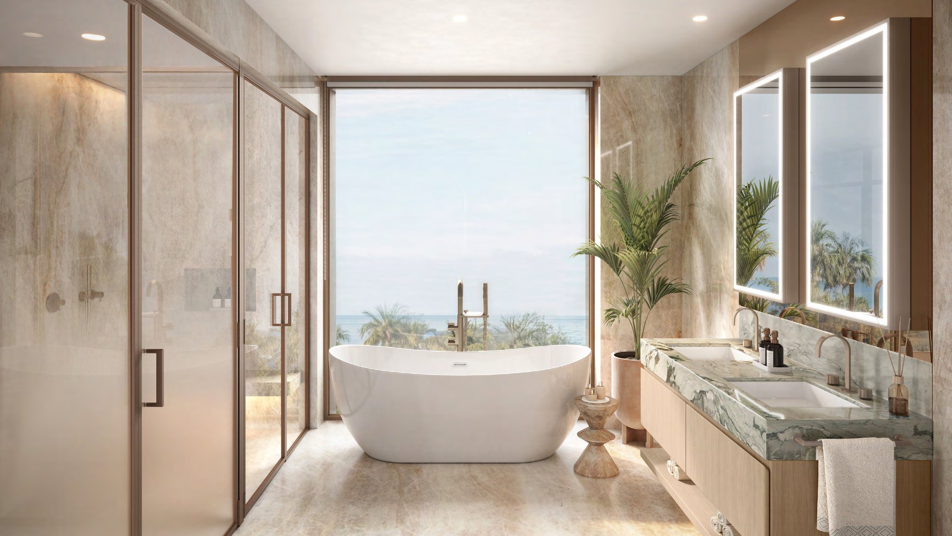 Marble ensuite with freestanding bath before a tall window to the sea