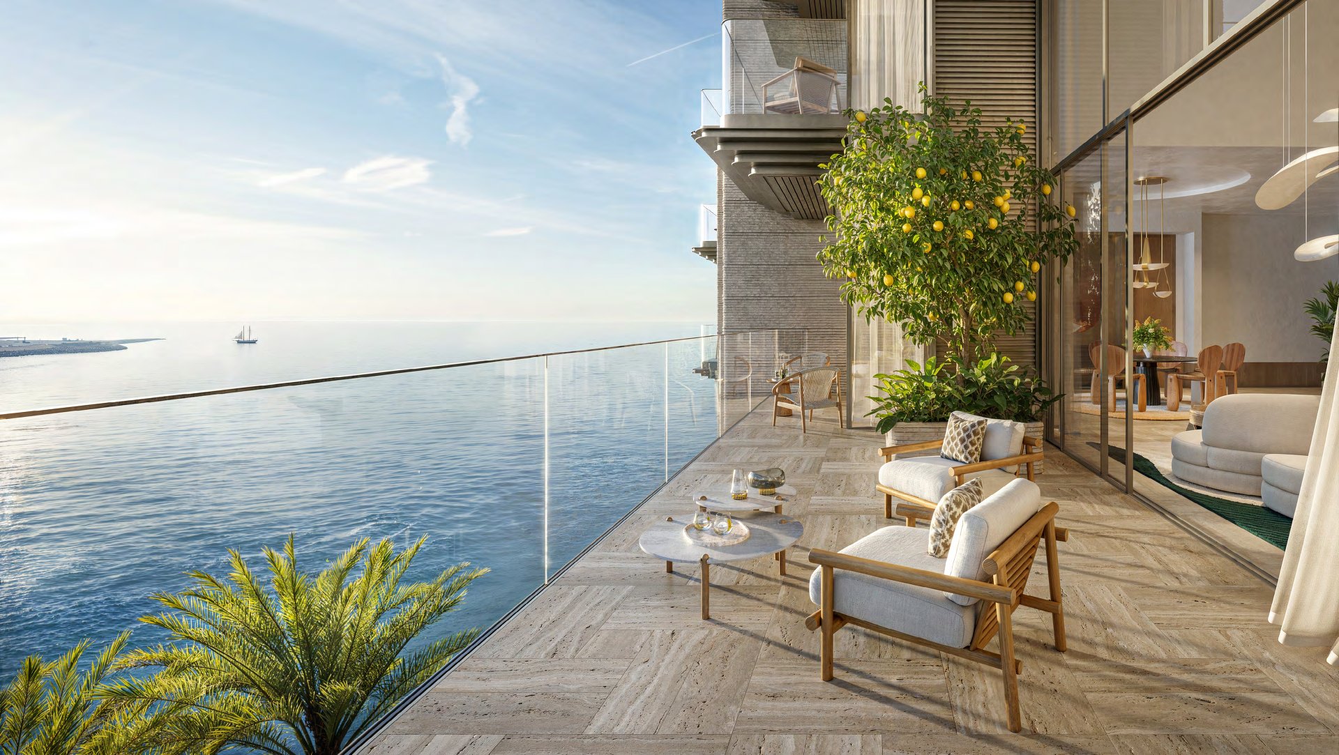 Duplex terrace with lemon tree and armchairs above the open sea